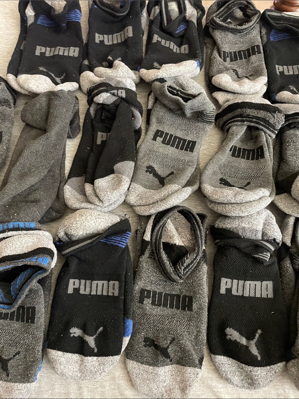 17 pairs of Puma Men's No-Show Athletic Socks in Black and Gray with Blue Accent